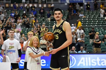 Nov 22, 2023; Honolulu, HI, USA; Purdue Boilermakers center Zach Edey (15) is presented the Most Valuable Player of the tournament by Chaminade University president Lynn Babington at SimpliFi Arena at Stan Sheriff Center. Mandatory Credit: Steven Erler-USA TODAY Sports
