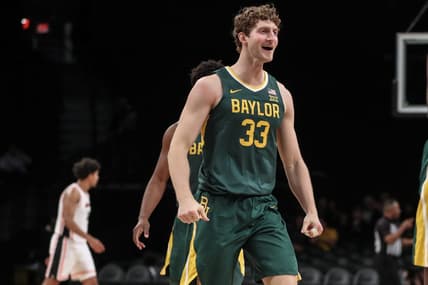 Nov 22, 2023; Brooklyn, NY, USA; Baylor Bears forward Caleb Lohner (33) celebrates after the Oregon State Beavers call a timeout in the first half at Barclay Center. Mandatory Credit: Wendell Cruz-USA TODAY Sports