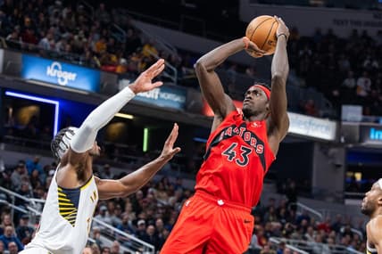 Nov 22, 2023; Indianapolis, Indiana, USA; Toronto Raptors forward Pascal Siakam (43) shoots the ball while Indiana Pacers guard Buddy Hield (left) defends in the first half at Gainbridge Fieldhouse. Mandatory Credit: Trevor Ruszkowski-USA TODAY Sports