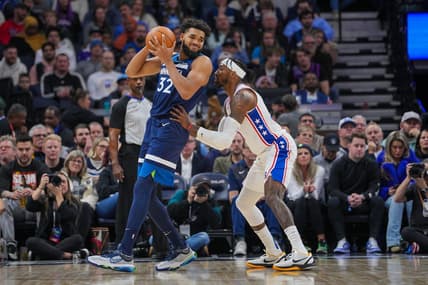Nov 22, 2023; Minneapolis, Minnesota, USA; Philadelphia 76ers forward Robert Covington (33) defends Minnesota Timberwolves center Karl-Anthony Towns (32) in the second quarter at Target Center. Mandatory Credit: Brad Rempel-USA TODAY Sports