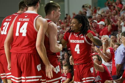 Nov 22, 2023; Fort Myers, FL, USA;  Wisconsin Badgers guard Kamari McGee (4) reacts a after a play against the Southern Methodist Mustangs in the first half during the Fort Myers Tip-Off championship game at Suncoast Credit Union Arena. Mandatory Credit: Nathan Ray Seebeck-USA TODAY Sports