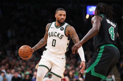 Nov 22, 2023; Boston, Massachusetts, USA; Milwaukee Bucks guard Damian Lillard (0) dribbles down the court during the second half against the Boston Celtics at TD Garden. Mandatory Credit: Paul Rutherford-USA TODAY Sports