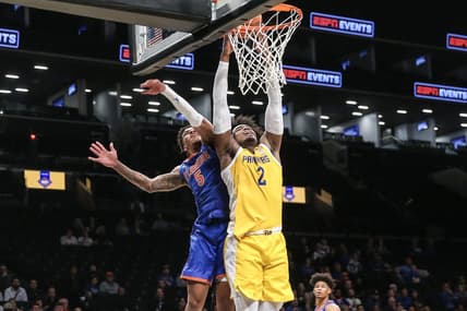 Nov 22, 2023; Brooklyn, New York, USA; Pittsburgh Panthers forward Blake Hinson (2) drives past Florida Gators guard Will Richard (5) for a dunk attempt in the first half at Barclays Center. Mandatory Credit: Wendell Cruz-USA TODAY Sports
