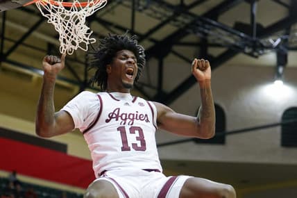 Nov 23, 2023; Kissimmee, FL, USA;  Texas A&M Aggies forward Solomon Washington (13) dunks the ball against the Penn State Nittany Lions in the second half during the ESPN Events Invitational at State Farm Field House. Mandatory Credit: Nathan Ray Seebeck-USA TODAY Sports
