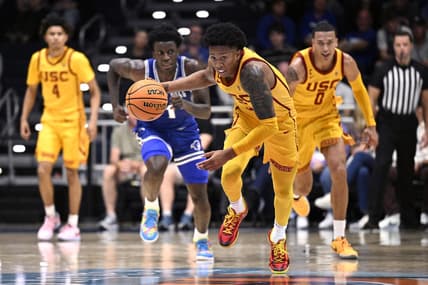 Nov 23, 2023; La Jolla, California, USA; USC Trojans guard Boogie Ellis (5) grabs a loose ball during the first half against the Seton Hall Pirates at LionTree Arena. Mandatory Credit: Orlando Ramirez-USA TODAY Sports