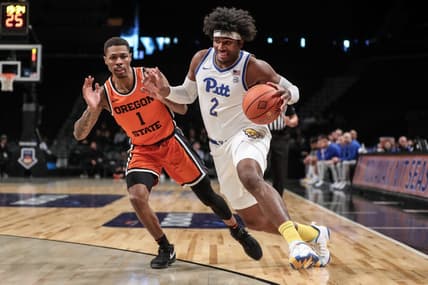 Nov 24, 2023; Brooklyn, NY, USA;  Pittsburgh Panthers forward Blake Hinson (2) drives past Oregon State Beavers guard Christian Wright (1) in the first half at Barclay Center. Mandatory Credit: Wendell Cruz-USA TODAY Sports