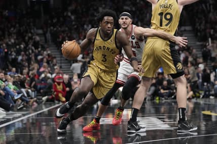 Nov 24, 2023; Toronto, Ontario, CAN; Toronto Raptors forward O.G. Anunoby (3) drives to the basket as Chicago Bulls guard Alex Caruso (6) pursues during the first half at Scotiabank Arena. Mandatory Credit: John E. Sokolowski-USA TODAY Sports