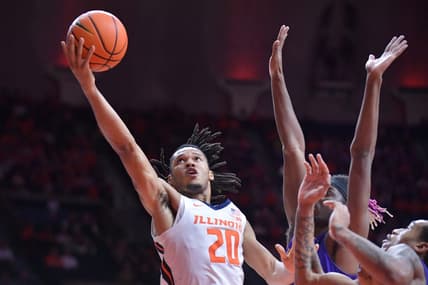 Nov 24, 2023; Champaign, Illinois, USA;  Illinois Fighting Illini forward Ty Rodgers (20) drives to the basket during the first half against the Western Illinois Leathernecks at State Farm Center. Mandatory Credit: Ron Johnson-USA TODAY Sports