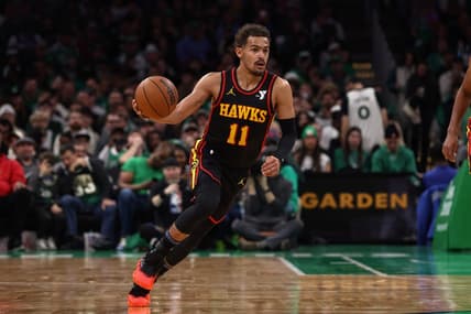 Nov 26, 2023; Boston, Massachusetts, USA; Atlanta Hawks guard Trae Young (11) brings the ball up the court against the Boston Celtics during the second quarter at TD Garden. Mandatory Credit: Winslow Townson-USA TODAY Sports