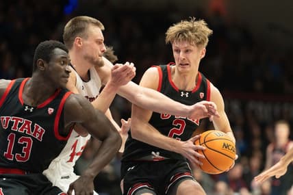 Nov 27, 2023; Moraga, California, USA;  Utah Utes guard Cole Bajema (2) controls the ball during the first half against St. Mary's Gaels center Mitchell Saxen (11) at University Credit Union Pavilion. Mandatory Credit: Stan Szeto-USA TODAY Sports