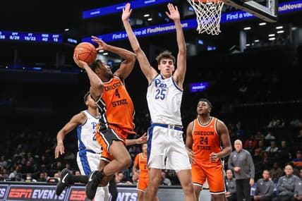 Nov 24, 2023; Brooklyn, NY, USA;  Oregon State Beavers guard Dexter Akanno (4) and Pittsburgh Panthers forward Guillermo Diaz Graham (25) at Barclay Center. Mandatory Credit: Wendell Cruz-USA TODAY Sports