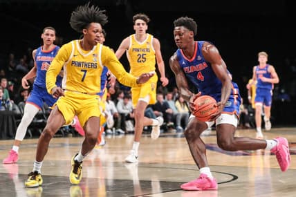 Nov 22, 2023; Brooklyn, New York, USA;  Florida Gators forward Tyrese Samuel (4) and Pittsburgh Panthers guard Carlton Carrington (7) at Barclays Center. Mandatory Credit: Wendell Cruz-USA TODAY Sports