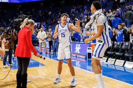 Nov 28, 2023; Lexington, Kentucky, USA; Kentucky Wildcats forward Tre Mitchell (4) dumps water on guard Reed Sheppard (15) after the game against the Miami (Fl) Hurricanes at Rupp Arena at Central Bank Center. Mandatory Credit: Jordan Prather-USA TODAY Sports