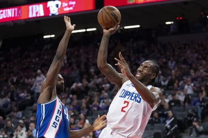 November 29, 2023; Sacramento, California, USA; LA Clippers forward Kawhi Leonard (2) shoots the basketball against Sacramento Kings forward Harrison Barnes (40) during the third quarter at Golden 1 Center. Mandatory Credit: Kyle Terada-USA TODAY Sports
