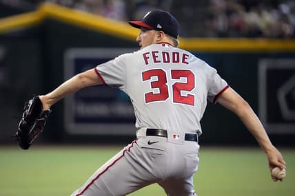 Jul 24, 2022; Phoenix, Arizona, USA; Washington Nationals starting pitcher Erick Fedde (32) pitches against the Arizona Diamondbacks during the first inning at Chase Field. Mandatory Credit: Joe Camporeale-USA TODAY Sports