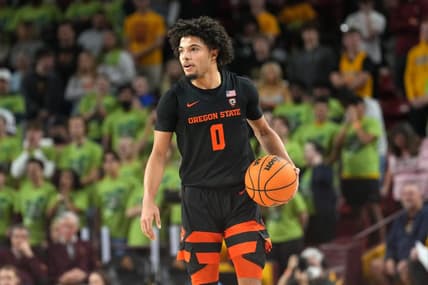 Feb 2, 2023; Tempe, Arizona, USA; Oregon State Beavers guard Jordan Pope (0) dribbles against the Arizona State Sun Devils during the first half at Desert Financial Arena. Mandatory Credit: Joe Camporeale-USA TODAY Sports