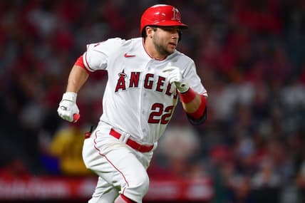 Sep 26, 2023; Anaheim, California, USA; Los Angeles Angels second baseman David Fletcher (22) runs after hitting a single against the Texas Rangers during the fifth inning at Angel Stadium. Mandatory Credit: Gary A. Vasquez-USA TODAY Sports