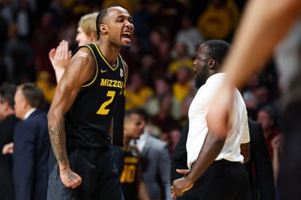 Nov 16, 2023; Minneapolis, Minnesota, USA; Missouri Tigers guard Tamar Bates (2) celebrates the win against the Minnesota Golden Gophers at Williams Arena. Mandatory Credit: Matt Krohn-USA TODAY Sports