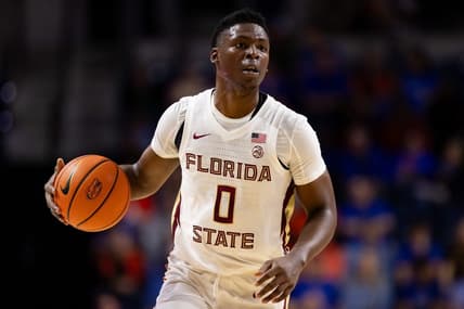 Nov 17, 2023; Gainesville, Florida, USA; Florida State Seminoles guard Chandler Jackson (0) dribbles the ball during the first half against the Florida Gators at Exactech Arena at the Stephen C. O'Connell Center. Mandatory Credit: Matt Pendleton-USA TODAY Sports