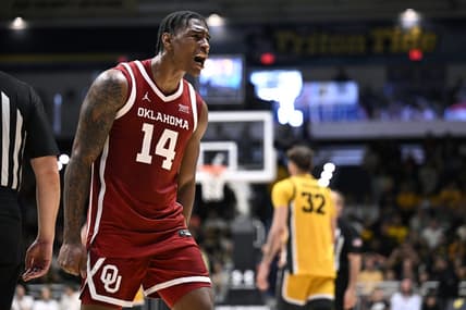 Nov 23, 2023; La Jolla, California, USA; Oklahoma Sooners forward Jalon Moore (14) celebrates after defeating the Iowa Hawkeyes at LionTree Arena. Mandatory Credit: Orlando Ramirez-USA TODAY Sports