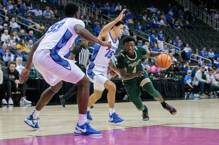 Nov 23, 2023; Kansas City, Missouri, USA; Colorado State Rams guard Isaiah Stevens (4) drives around Creighton Bluejays guard Josiah Dotzler (15) during the second half at T-Mobile Center. Mandatory Credit: William Purnell-USA TODAY Sports