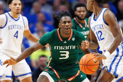 Nov 28, 2023; Lexington, Kentucky, USA; Miami (Fl) Hurricanes guard Christian Watson (3) guards Kentucky Wildcats guard Antonio Reeves (12) during the first half at Rupp Arena at Central Bank Center. Mandatory Credit: Jordan Prather-USA TODAY Sports
