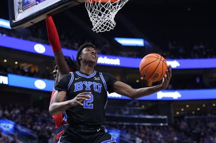 Dec 1, 2023; Salt Lake City, Utah, USA; Brigham Young Cougars guard Jaxson Robinson (2) lays the ball up against the Fresno State Bulldogs during the first half at Delta Center. Mandatory Credit: Rob Gray-USA TODAY Sports