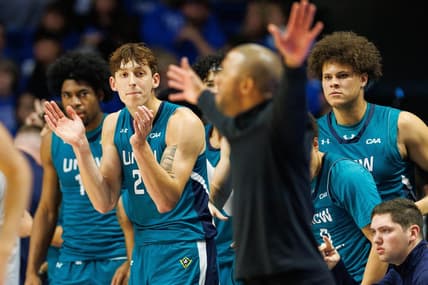 Dec 2, 2023; Lexington, Kentucky, USA; North Carolina-Wilmington Seahawks forward Eric Van Der Heijden (23) celebrates from the bench during the second half against the Kentucky Wildcats at Rupp Arena at Central Bank Center. Mandatory Credit: Jordan Prather-USA TODAY Sports
