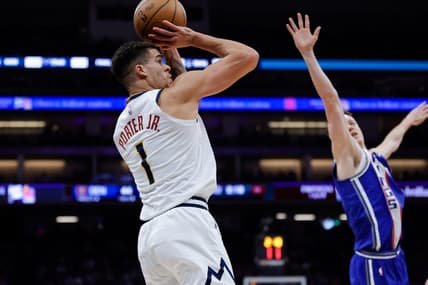 Dec 2, 2023; Sacramento, California, USA; Denver Nuggets forward Michael Porter Jr. (1) shoots the ball against Sacramento Kings guard Kevin Huerter (9) during the second quarter at Golden 1 Center. Mandatory Credit: Sergio Estrada-USA TODAY Sports