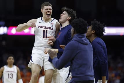 Dec 5, 2023; Charlottesville, Virginia, USA; Virginia Cavaliers guard Isaac McKneely (11) celebrates with teammates against the North Carolina Central Eagles in the first half at John Paul Jones Arena. Mandatory Credit: Geoff Burke-USA TODAY Sports