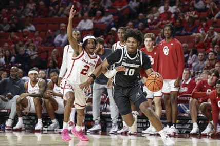Dec 5, 2023; Norman, Oklahoma, USA; Providence Friars forward Rich Barron (10) drives against Oklahoma Sooners guard Javian McCollum (2) during the first half at Lloyd Noble Center. Mandatory Credit: Alonzo Adams-USA TODAY Sports