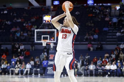 Dec 5, 2023; Oxford, Mississippi, USA; Mississippi Rebels guard Robert Cowherd (13) shoots for three during the first half at The Sandy and John Black Pavilion at Ole Miss. Mandatory Credit: Petre Thomas-USA TODAY Sports