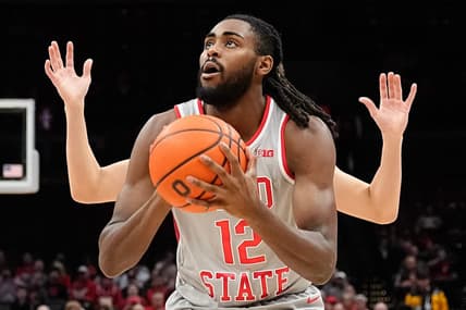 Dec 6, 2023; Columbus, OH, USA; Ohio State Buckeyes guard Evan Mahaffey (12) picks up his dribble in front of a Miami Redhawks defender during the first half of the NCAA men   s basketball game at Value City Arena.