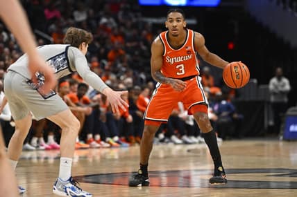 Dec 9, 2023; Washington, District of Columbia, USA; Syracuse Orange guard Judah Mintz (3) dribbles as Georgetown Hoyas guard Rowan Brumbaugh (1) defends during the first half at Capital One Arena. Mandatory Credit: Brad Mills-USA TODAY Sports