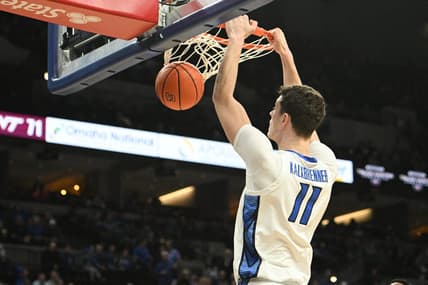 Dec 9, 2023; Omaha, Nebraska, USA;  Creighton Bluejays center Ryan Kalkbrenner (11) dunks against the Central Michigan Chippewas in the second half at CHI Health Center Omaha. Mandatory Credit: Steven Branscombe-USA TODAY Sports