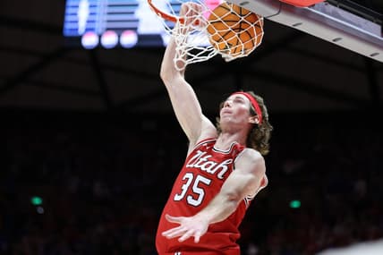 Dec 9, 2023; Salt Lake City, Utah, USA; Utah Utes center Branden Carlson (35) dunks the ball against the Brigham Young Cougars during the second half at Jon M. Huntsman Center. Mandatory Credit: Rob Gray-USA TODAY Sports