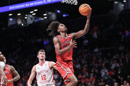 Dec 10, 2023; Brooklyn, New York, USA;  St. John's Red Storm forward Glenn Taylor Jr. (35) drives in for a layup in the first half against the Boston College Eagles at Barclays Center. Mandatory Credit: Wendell Cruz-USA TODAY Sports