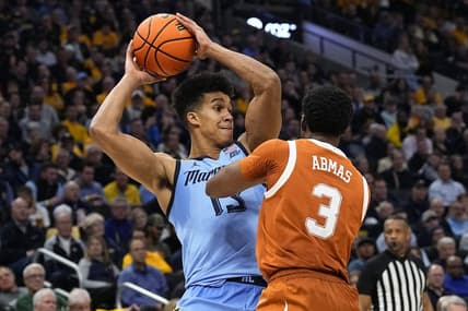 Dec 6, 2023; Milwaukee, Wisconsin, USA;  Marquette Golden Eagles forward Oso Ighodaro (13) during the game against the Texas Longhorns at Fiserv Forum. Mandatory Credit: Jeff Hanisch-USA TODAY Sports