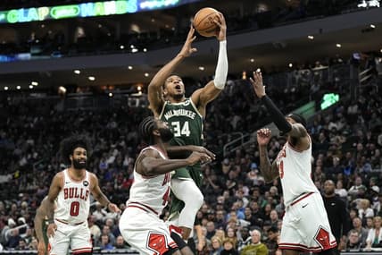Dec 11, 2023; Milwaukee, Wisconsin, USA;  Milwaukee Bucks forward Giannis Antetokounmpo (34) shoots over Chicago Bulls forward Patrick Williams (44) during the fourth quarter at Fiserv Forum. Mandatory Credit: Jeff Hanisch-USA TODAY Sports