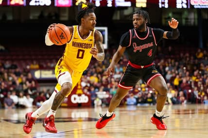 Dec 12, 2023; Minneapolis, Minnesota, USA; Minnesota Golden Gophers guard Elijah Hawkins (0) drives to the basket as IUPUI Jaguars guard Bryce Monroe (4) defends during the first half at Williams Arena. Mandatory Credit: Matt Krohn-USA TODAY Sports