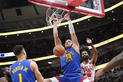 Dec 12, 2023; Chicago, Illinois, USA; Denver Nuggets forward Aaron Gordon (50) dunks the ball against the Chicago Bulls during the second half at United Center. Mandatory Credit: David Banks-USA TODAY Sports