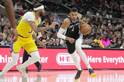 Dec 13, 2023; San Antonio, Texas, USA;  San Antonio Spurs center Victor Wembanyama (1) dribbles against Los Angeles Lakers forward Anthony Davis (3) in the first half at the Frost Bank Center. Mandatory Credit: Daniel Dunn-USA TODAY Sports