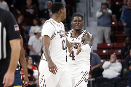 Dec 13, 2023; Starkville, Mississippi, USA; Mississippi State Bulldogs forward Cameron Matthews (4) reacts with Mississippi State Bulldogs forward D.J. Jeffries (0) during the second half against the Murray State Racers at Humphrey Coliseum. Mandatory Credit: Petre Thomas-USA TODAY Sports