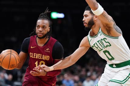 Dec 14, 2023; Boston, Massachusetts, USA; Cleveland Cavaliers guard Darius Garland (10) drives the ball against Boston Celtics forward Jayson Tatum (0) in the first quarter at TD Garden. Mandatory Credit: David Butler II-USA TODAY Sports