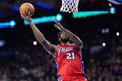 Dec 15, 2023; Philadelphia, Pennsylvania, USA; Philadelphia 76ers center Joel Embiid (21) drives for a shot against the Detroit Pistons during the first quarter at Wells Fargo Center. Mandatory Credit: Bill Streicher-USA TODAY Sports
