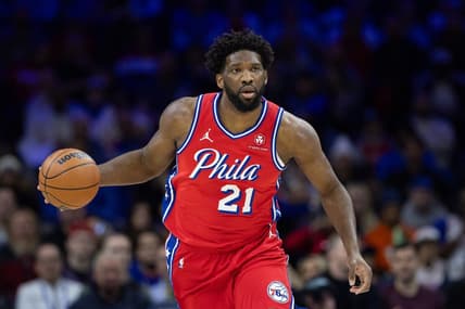 Dec 15, 2023; Philadelphia, Pennsylvania, USA; Philadelphia 76ers center Joel Embiid (21) dribbles up court against the Detroit Pistons during the first quarter at Wells Fargo Center. Mandatory Credit: Bill Streicher-USA TODAY Sports