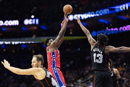 Dec 15, 2023; Philadelphia, Pennsylvania, USA; Philadelphia 76ers center Joel Embiid (21) shoots past Detroit Pistons center James Wiseman (13) during the second quarter at Wells Fargo Center. Mandatory Credit: Bill Streicher-USA TODAY Sports