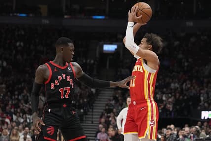 Dec 15, 2023; Toronto, Ontario, CAN; Toronto Raptors guard Dennis Schroder (17) defends against Atlanta Hawks guard Trae Young (11) during the first half at Scotiabank Arena. Mandatory Credit: John E. Sokolowski-USA TODAY Sports