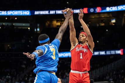 Dec 16, 2023; Atlanta, GA, USA; Ohio State Buckeyes guard Roddy Gayle Jr. (1) shoots over UCLA Bruins forward Adem Bona (3) during the first half at State Farm Arena. Mandatory Credit: Jordan Godfree-USA TODAY Sports
