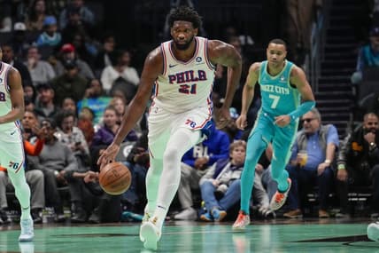 Dec 16, 2023; Charlotte, North Carolina, USA;Philadelphia 76ers center Joel Embiid (21) handles the ball against the Charlotte Hornets during the first quarter at Spectrum Center. Mandatory Credit: Jim Dedmon-USA TODAY Sports